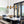 Suspension linéaire moderne noire à 4 lumières de 38,6 po avec abat-jour en verre à 2 niveaux pour îlot de cuisine